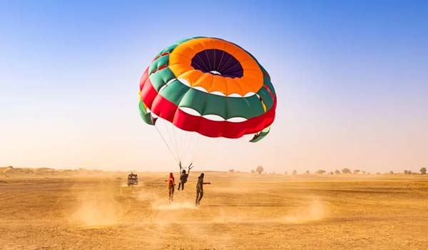 Paragliding over dunes